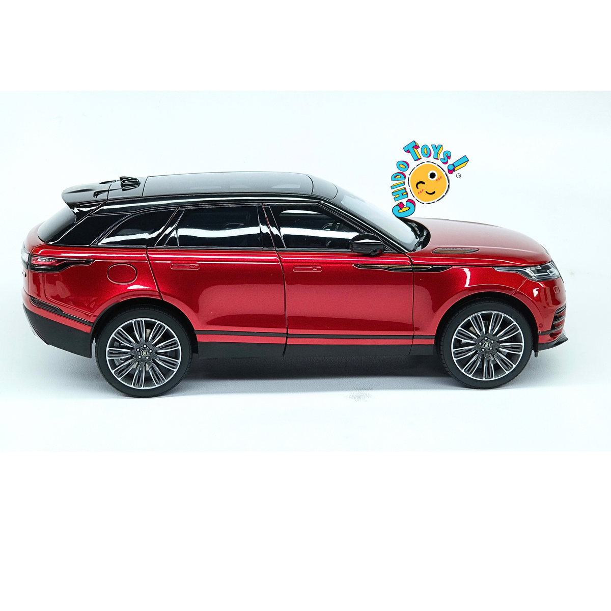 Range Rover Velar First Edition LCD Models 1:18 rojo metálico con apertura total