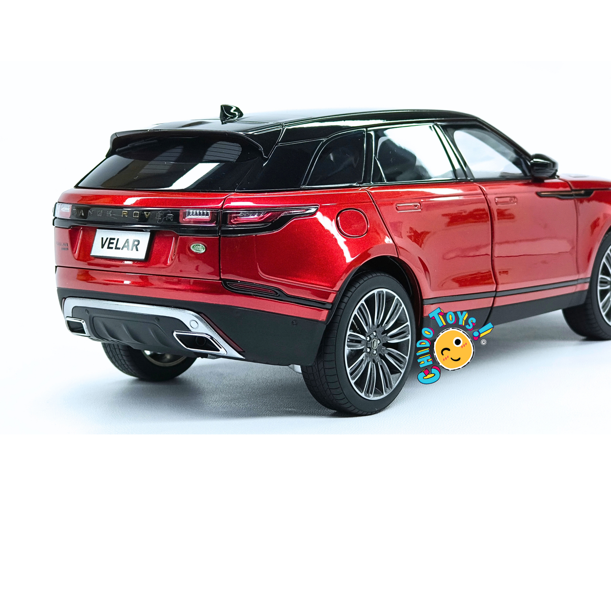 Range Rover Velar First Edition LCD Models 1:18 rojo metálico con apertura total