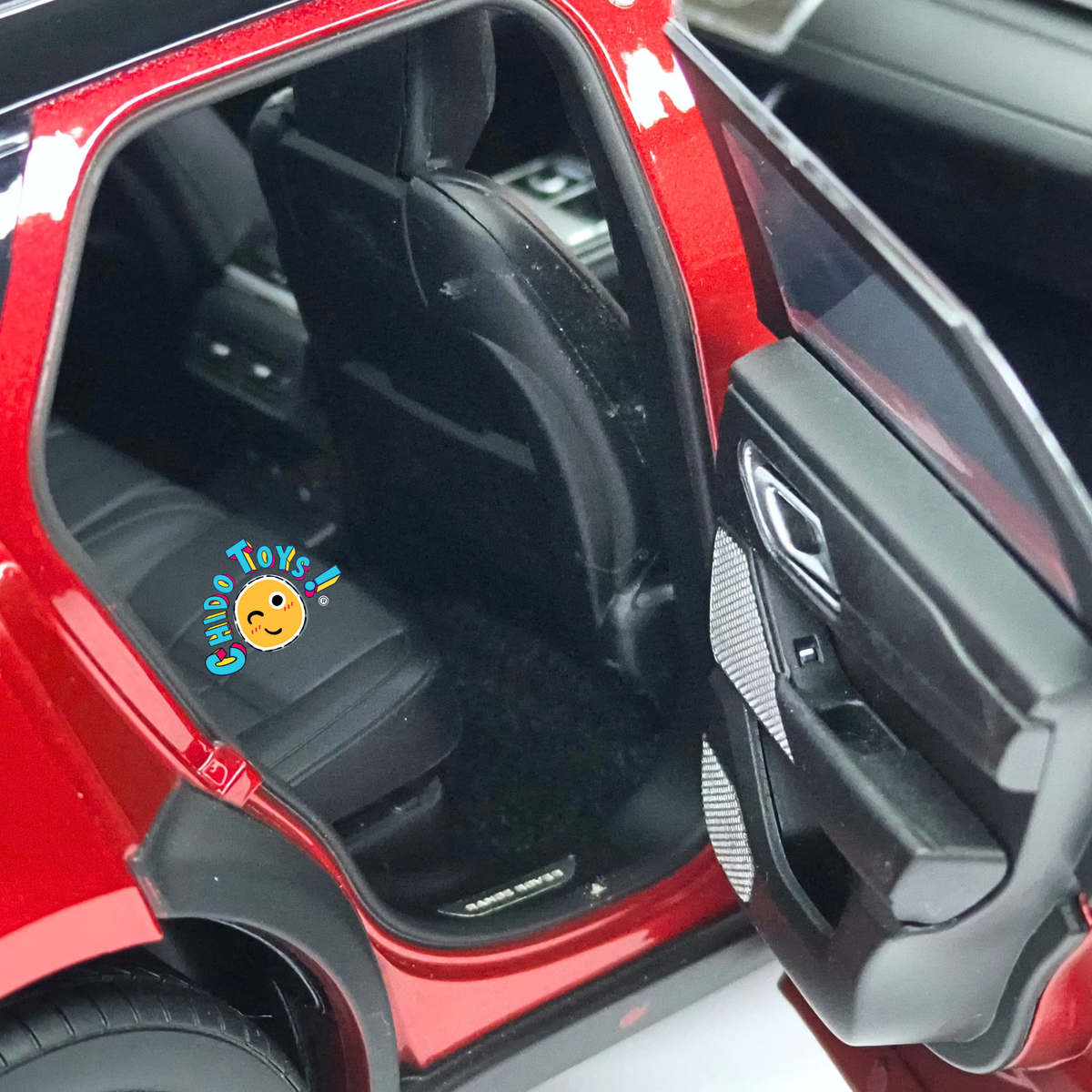 Range Rover Velar First Edition LCD Models 1:18 rojo metálico con apertura total