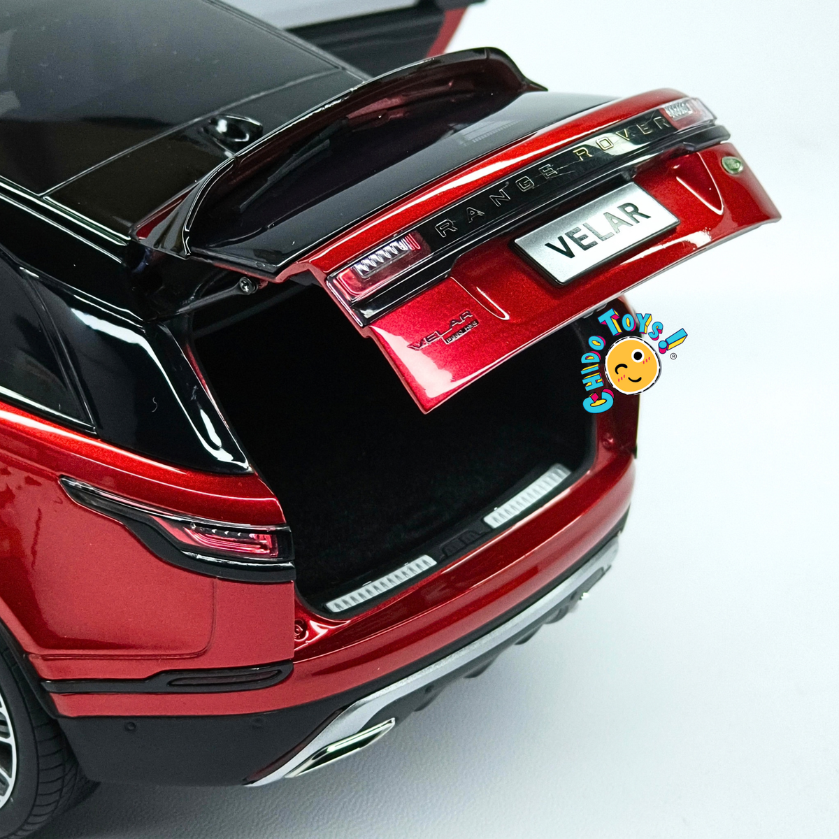 Range Rover Velar First Edition LCD Models 1:18 rojo metálico con apertura total