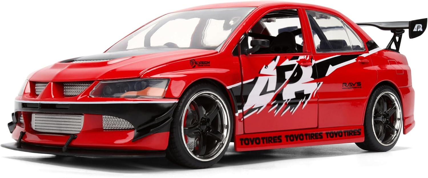 Jada Mitsubishi Lancer Evolution IX escala 1:24 rojo con llantas de goma, apertura de cofre, puertas y cajuela.