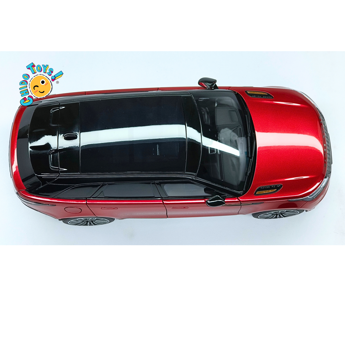 Range Rover Velar First Edition LCD Models 1:18 rojo metálico con apertura total