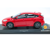 Ford Focus ST Minichamps 1:18 Race Red, diecast con llantas de goma, puertas delanteras abatibles y base original.