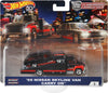 Hot Wheels Team Transport #1 con '69 Nissan Skyline Van y Carry On 1:64, Metal/Metal, Real Riders e incluye protector.