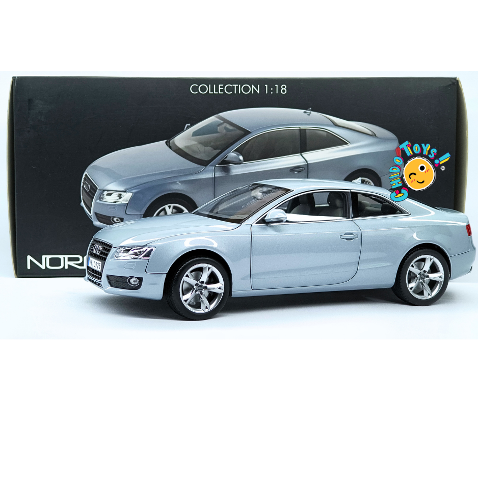 Norev Audi A5 Coupé 2007 1:18 Monza Silver, diecast con llantas de goma, apertura total y dirección funcional.
