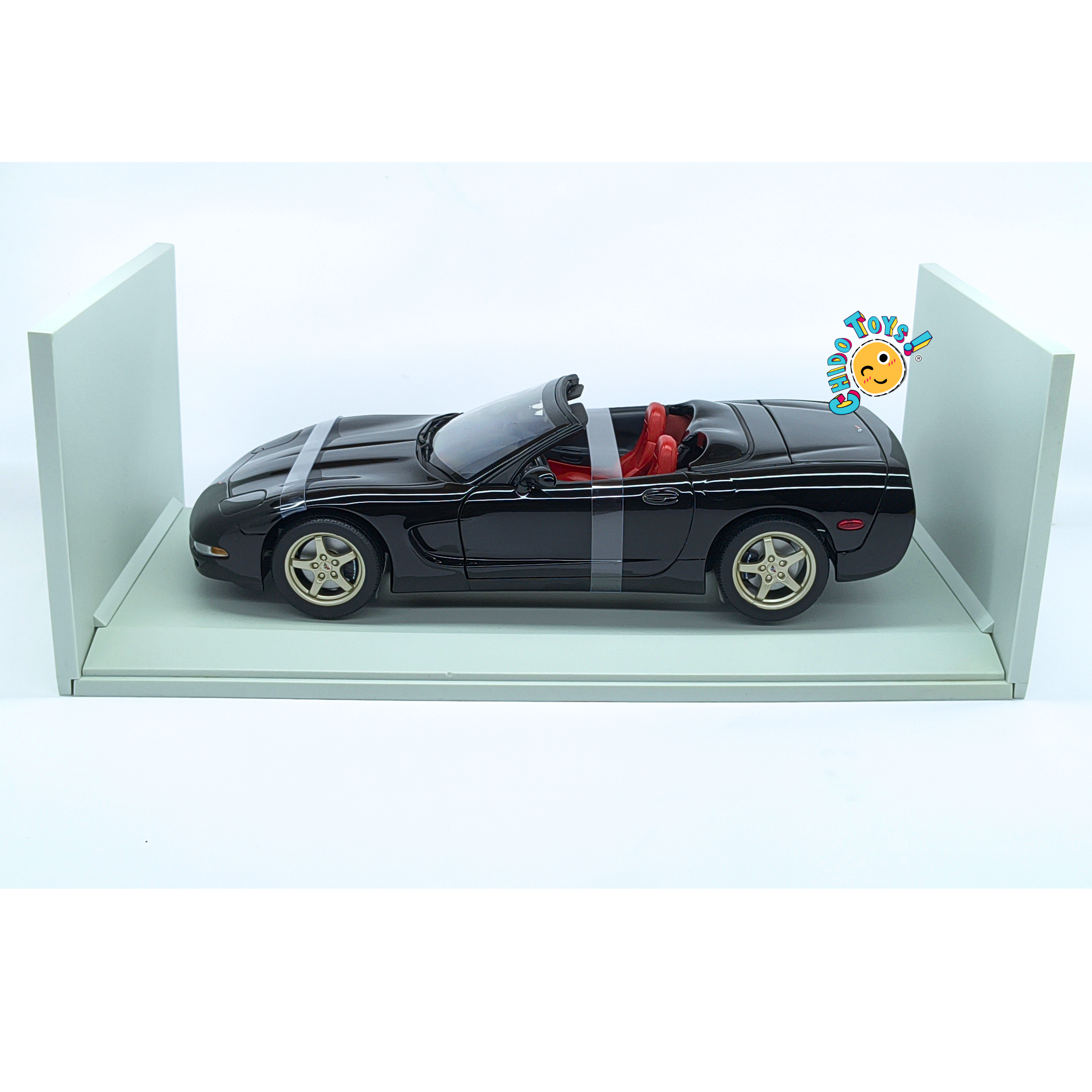 UT Models Chevrolet Corvette C5 1999 1:18 negro con interior rojo y caja original