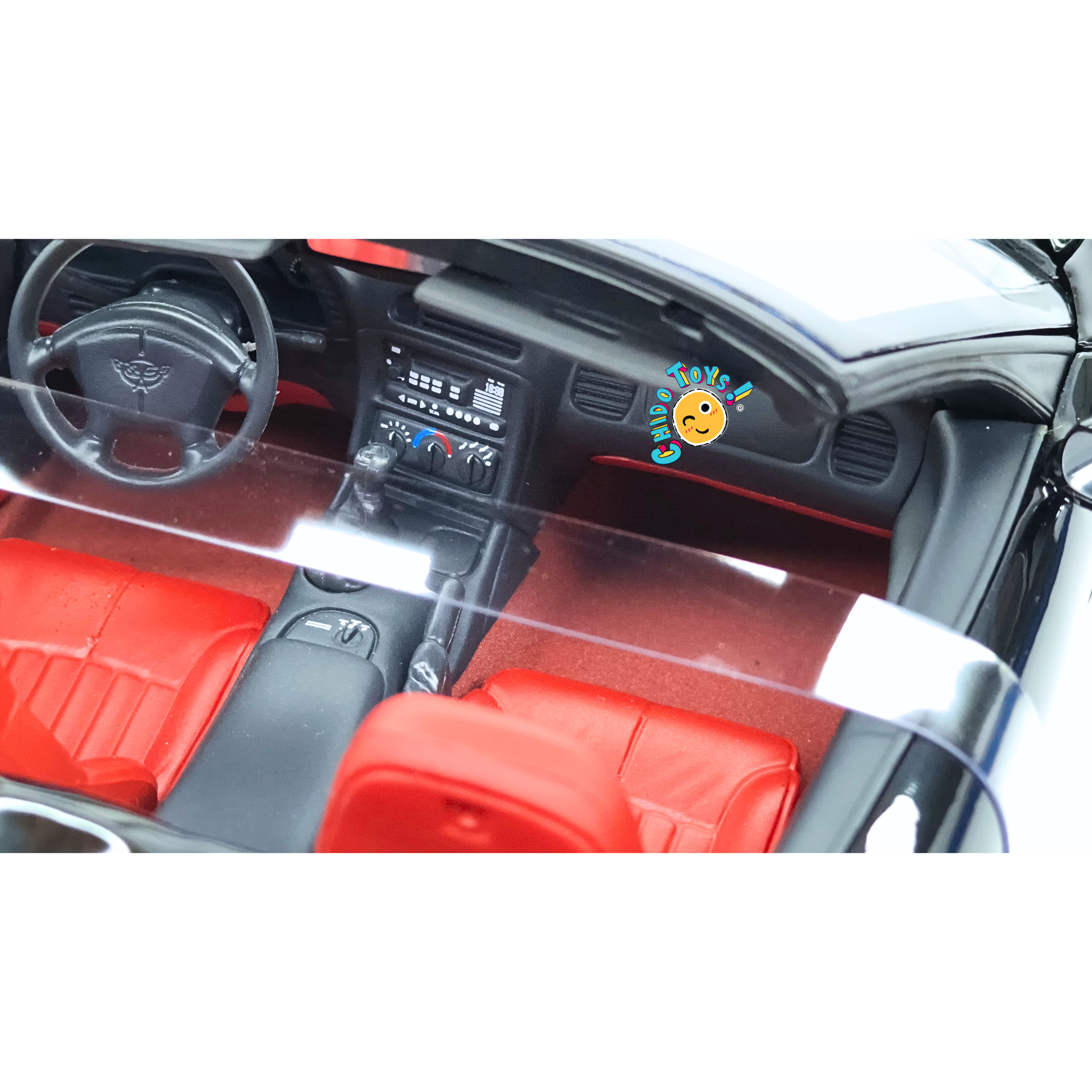 UT Models Chevrolet Corvette C5 1999 1:18 negro con interior rojo y caja original