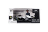 Bburago Cadillac F1 MAC-26 Sergio Pérez #11 1:43 plata y negro, con piloto, casco detallado, base y capelo transparente.