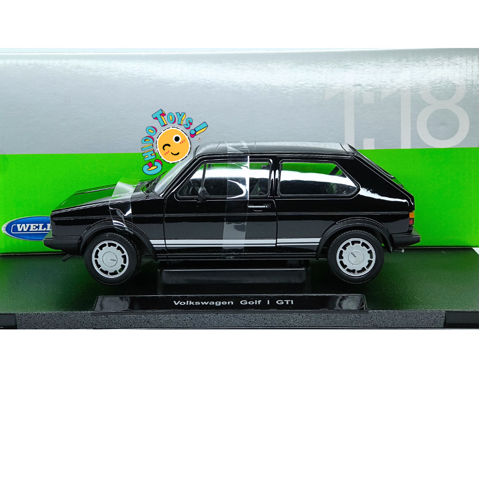 Welly NEX Volkswagen Golf I GTI escala 1:18 color negro con base de exhibición, aperturas funcionales y caja original.