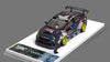 TPC Subaru WRX STI Travis Pastrana escala 1:64 edición limitada 119 de 499 con carrocería Metal/Metal, llantas de goma, figura y capelo acrílico.