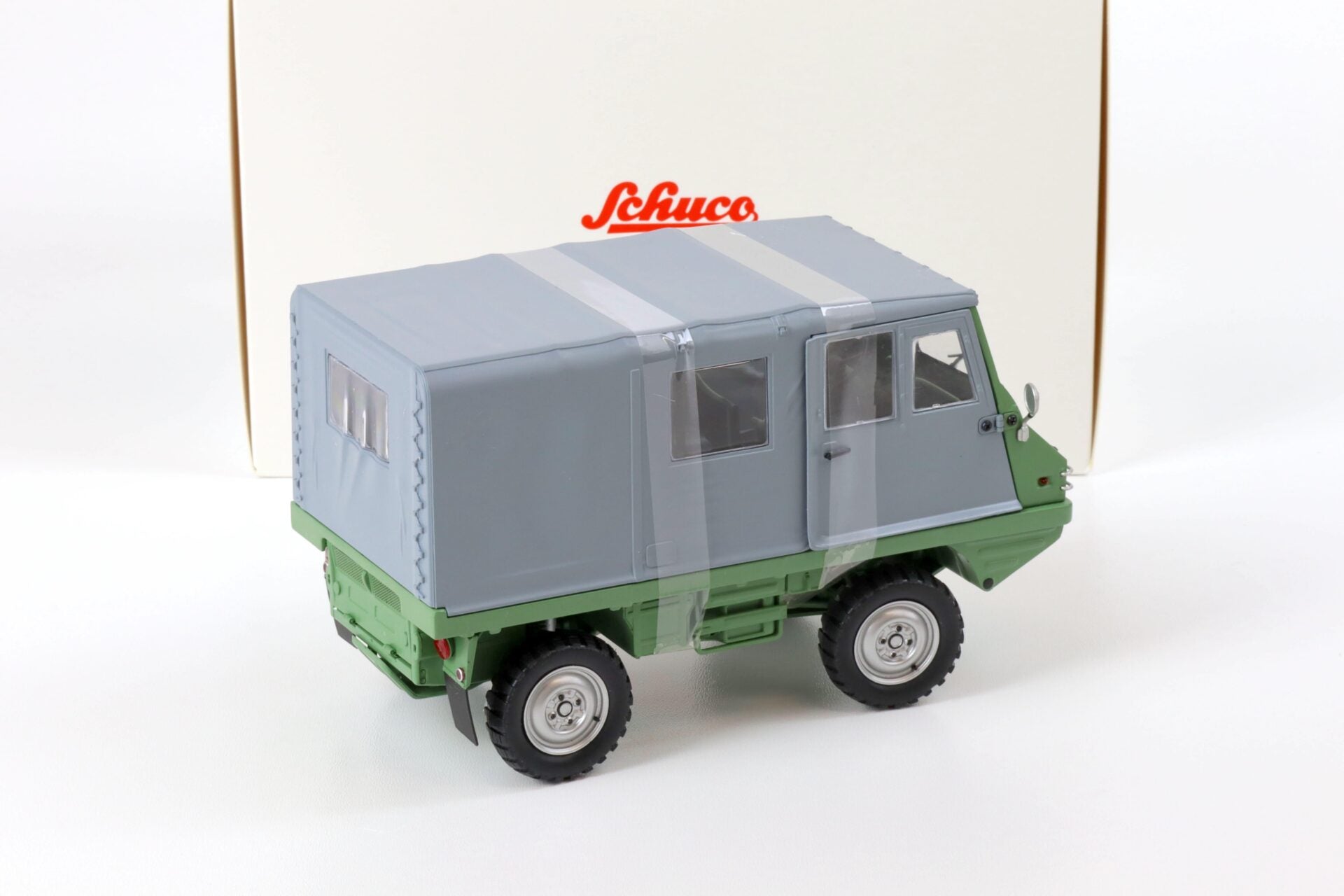 Schuco Steyr-Puch Haflinger 1:18 verde y gris edición limitada