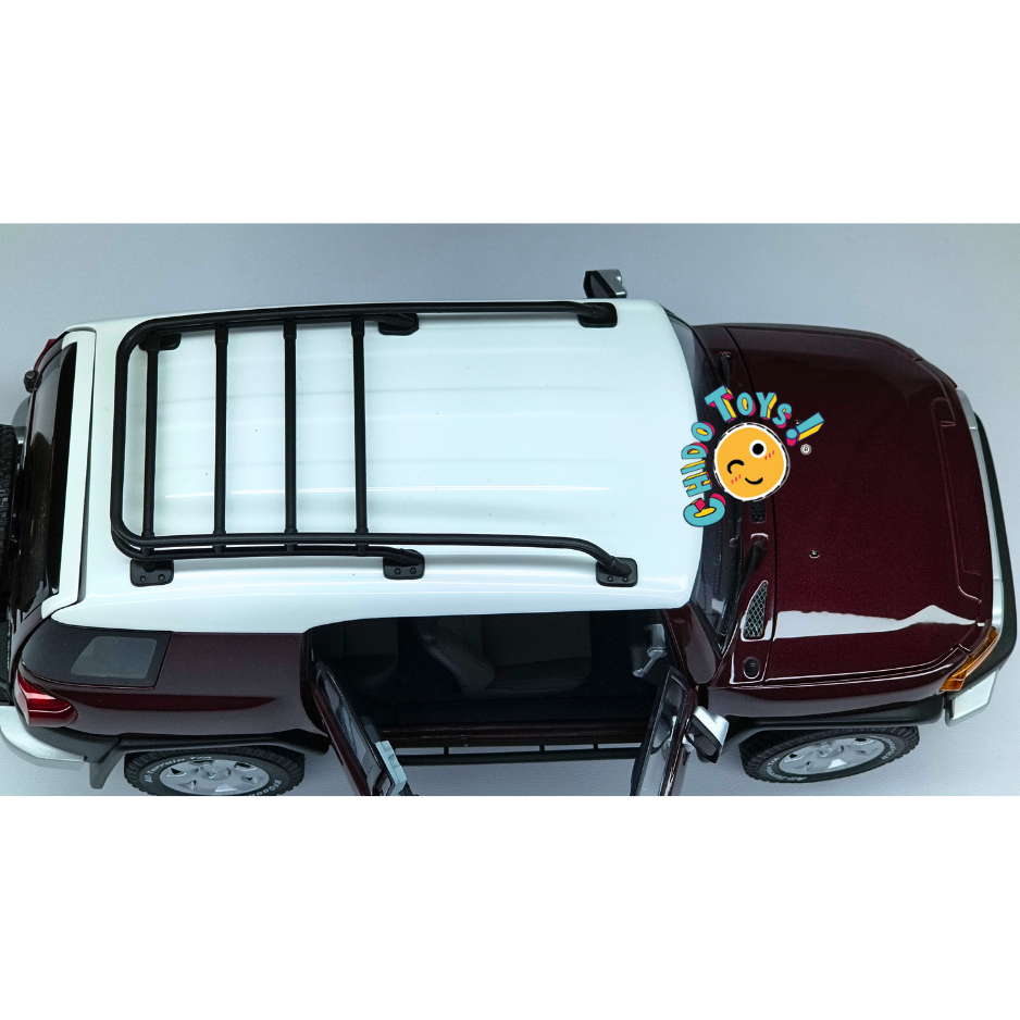 AUTOart Toyota FJ Cruiser Dealer Edition 1:18 Black Cherry Pearl Exclusivo con Techo Blanco