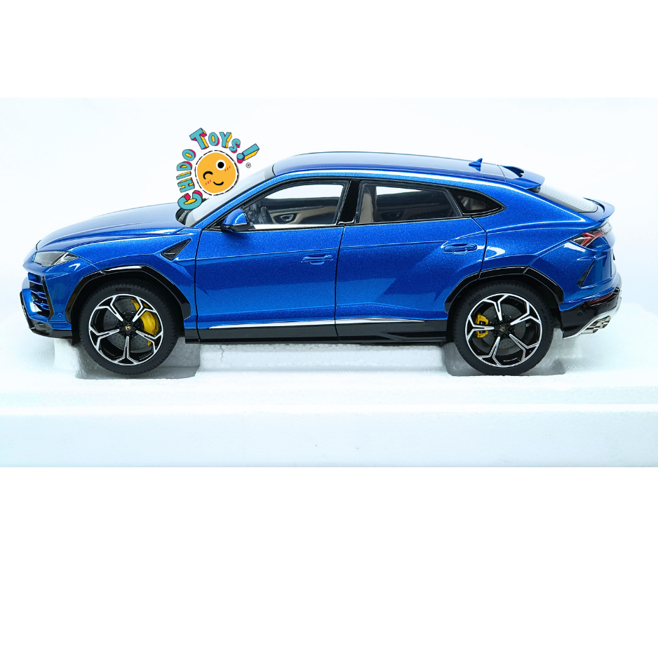 AUTOart Lamborghini Urus Blu Eleos 2018 escala 1:18 con apertura total, calipers amarillos personalizados, motor detallado y llantas Pirelli.