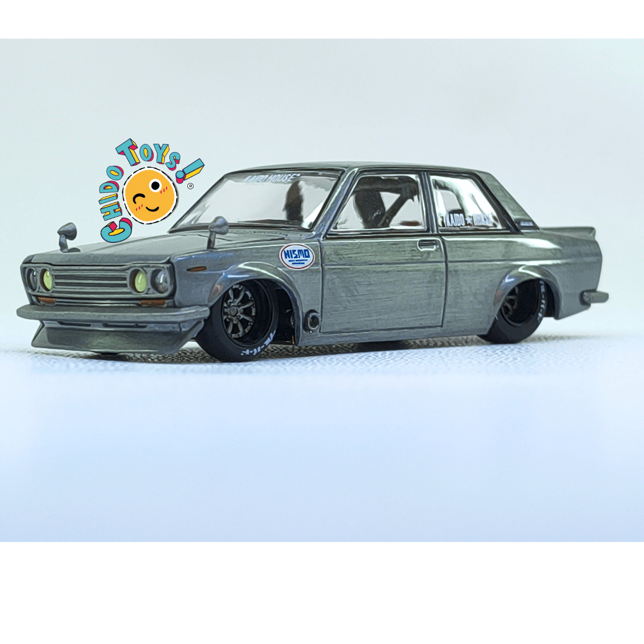 Auto a escala 1/64 Kaido House × Mini GT – Datsun 510 NISMO – Versión CHASE - Chido Toys