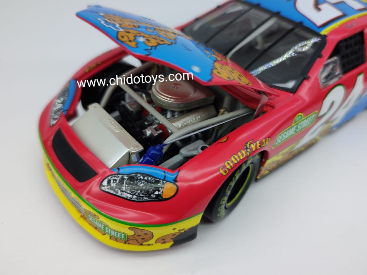 Auto a escala marca Action Racing, Modelo Monte Carlo 2003, Jeff Gordon Foundation 24 - Chido Toys