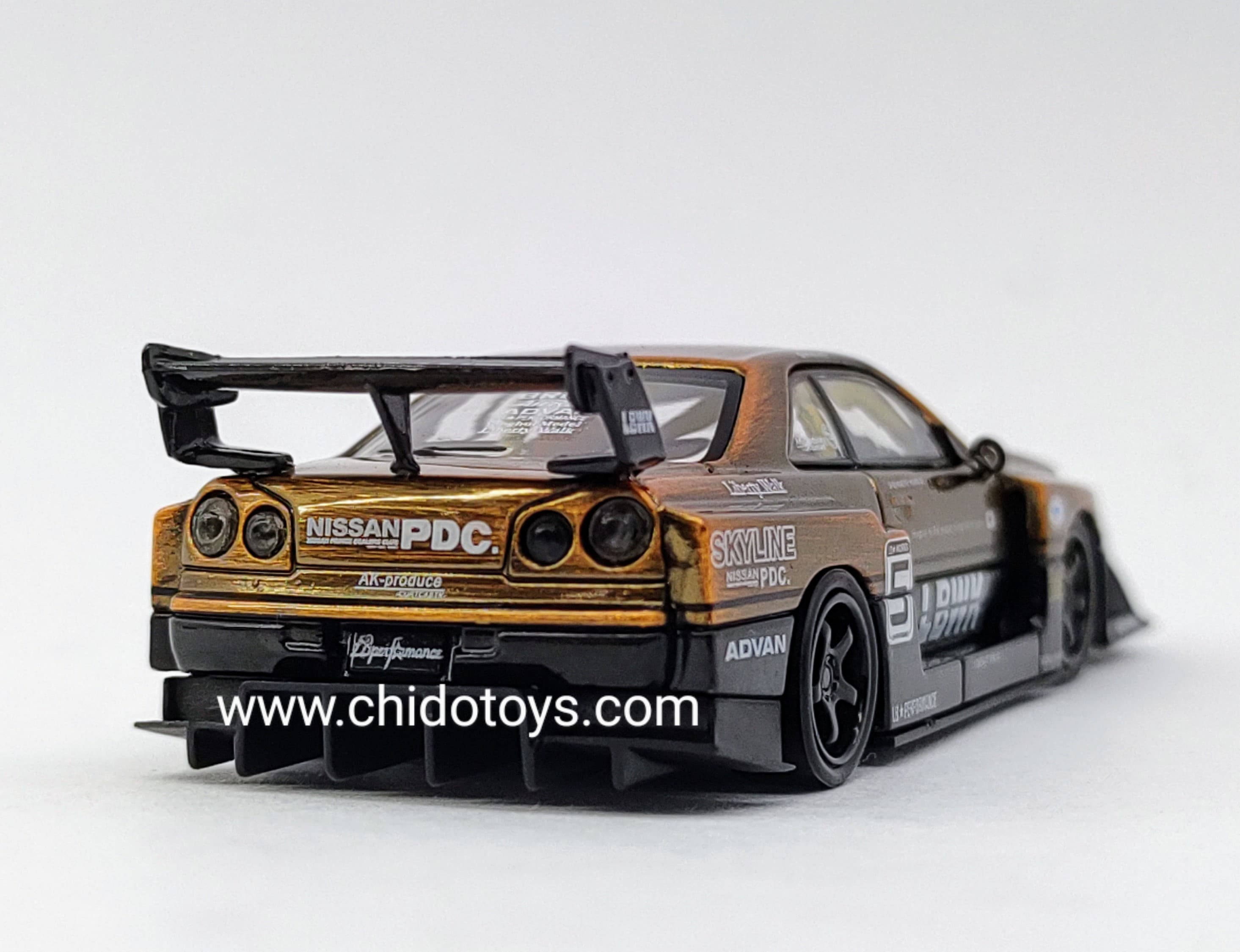 Auto a escala marca CM Model, Modelo LB - ER34 Super Silhouette Nissan Skyline Bronze - Chido Toys