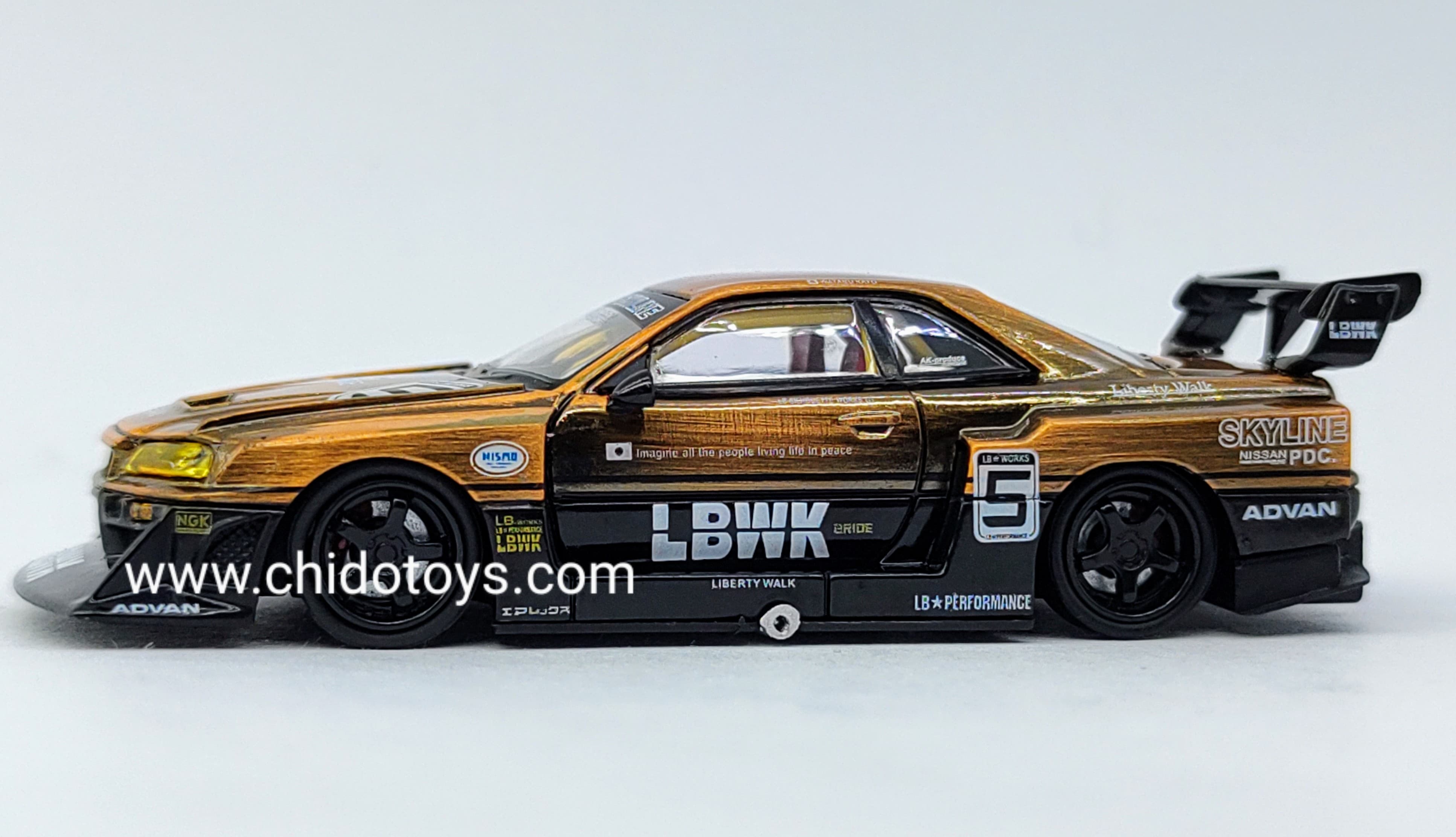 Auto a escala marca CM Model, Modelo LB - ER34 Super Silhouette Nissan Skyline Bronze - Chido Toys