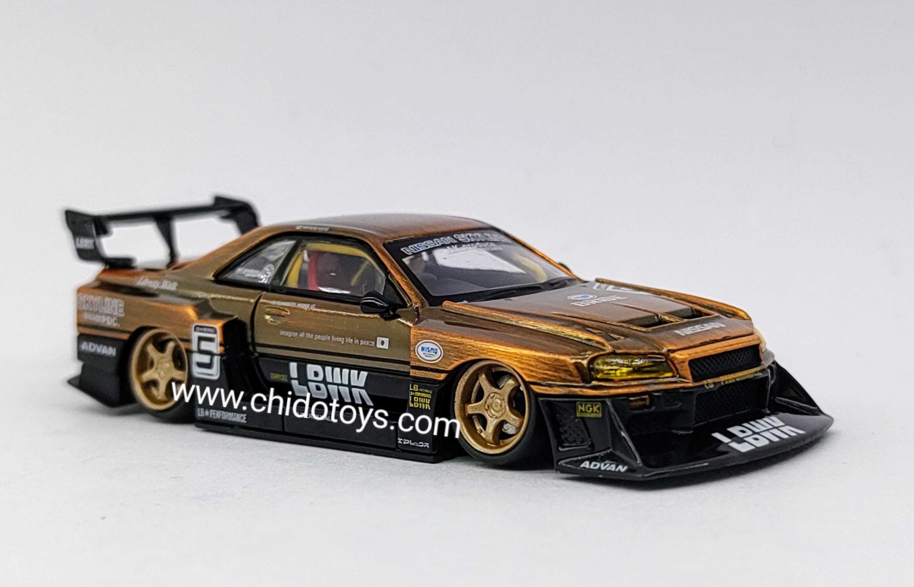 Auto a escala marca CM Model, Modelo LB - ER34 Super Silhouette Nissan Skyline Bronze - Chido Toys