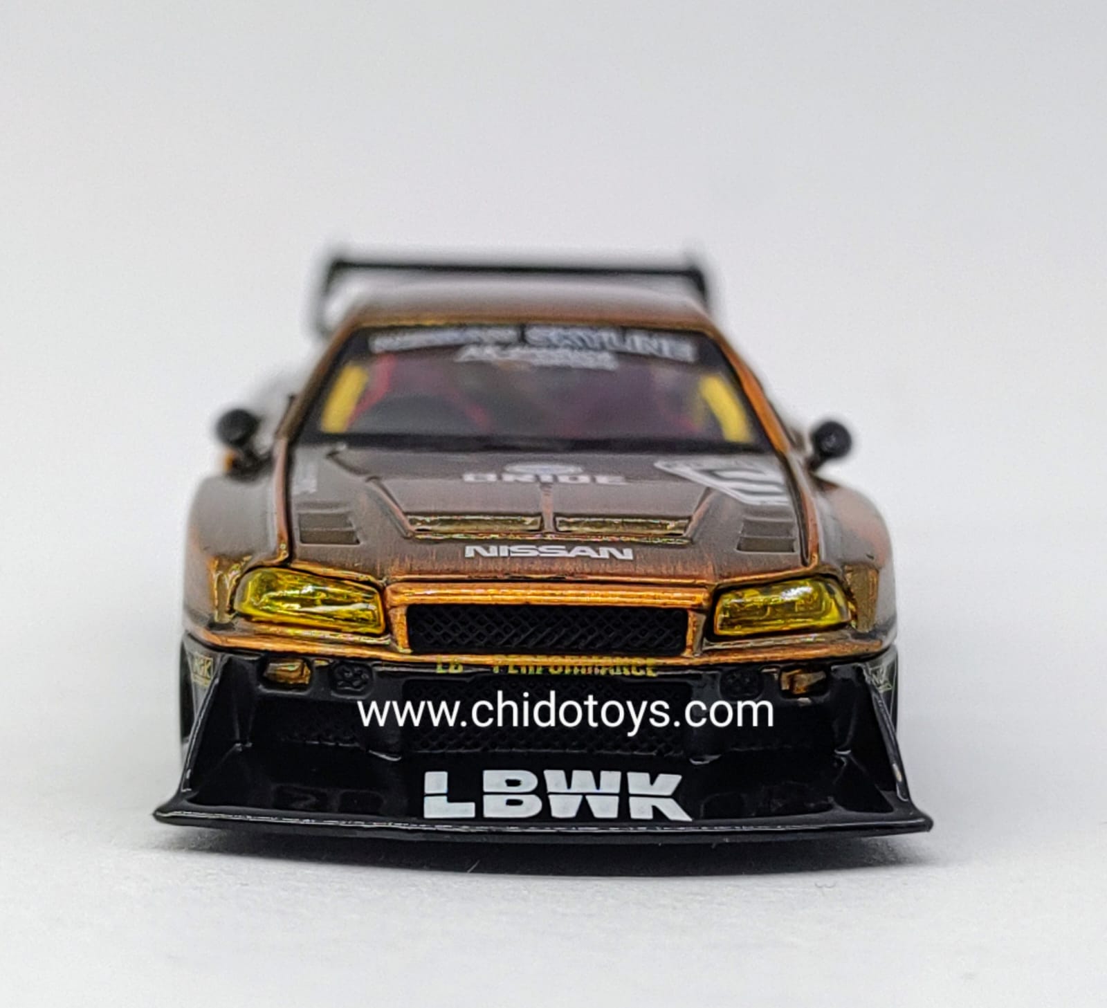 Auto a escala marca CM Model, Modelo LB - ER34 Super Silhouette Nissan Skyline Bronze - Chido Toys