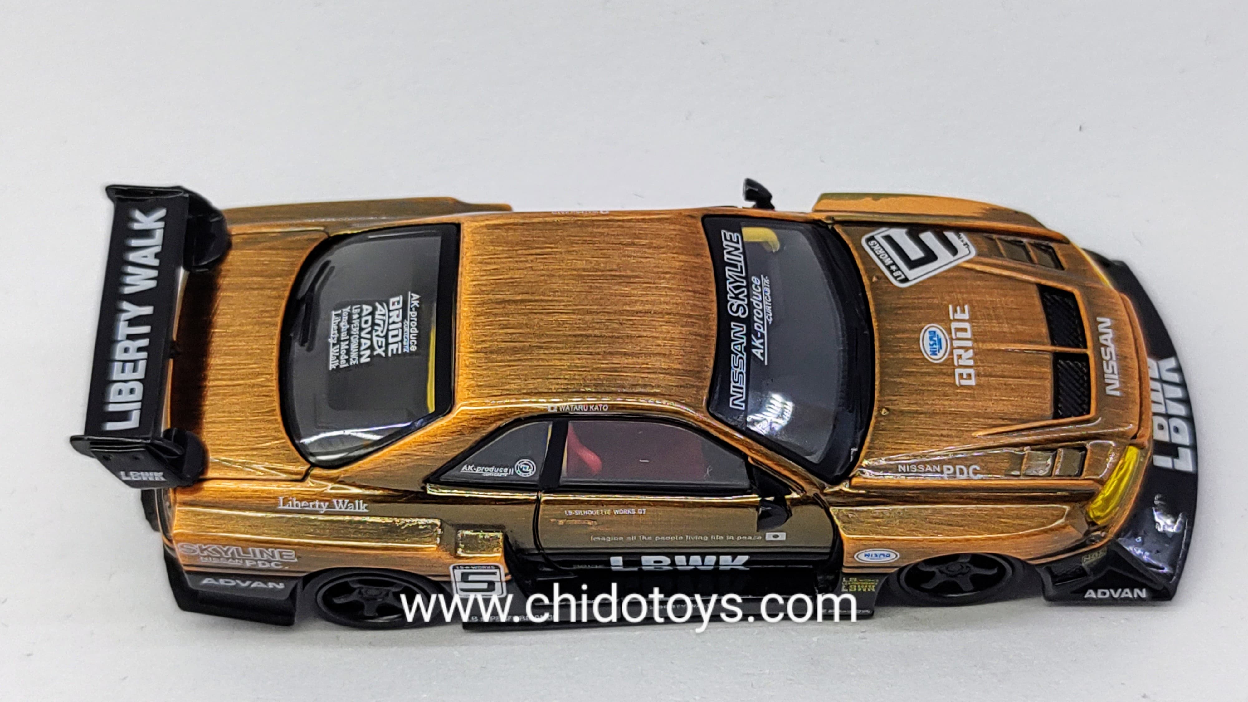 Auto a escala marca CM Model, Modelo LB - ER34 Super Silhouette Nissan Skyline Bronze - Chido Toys