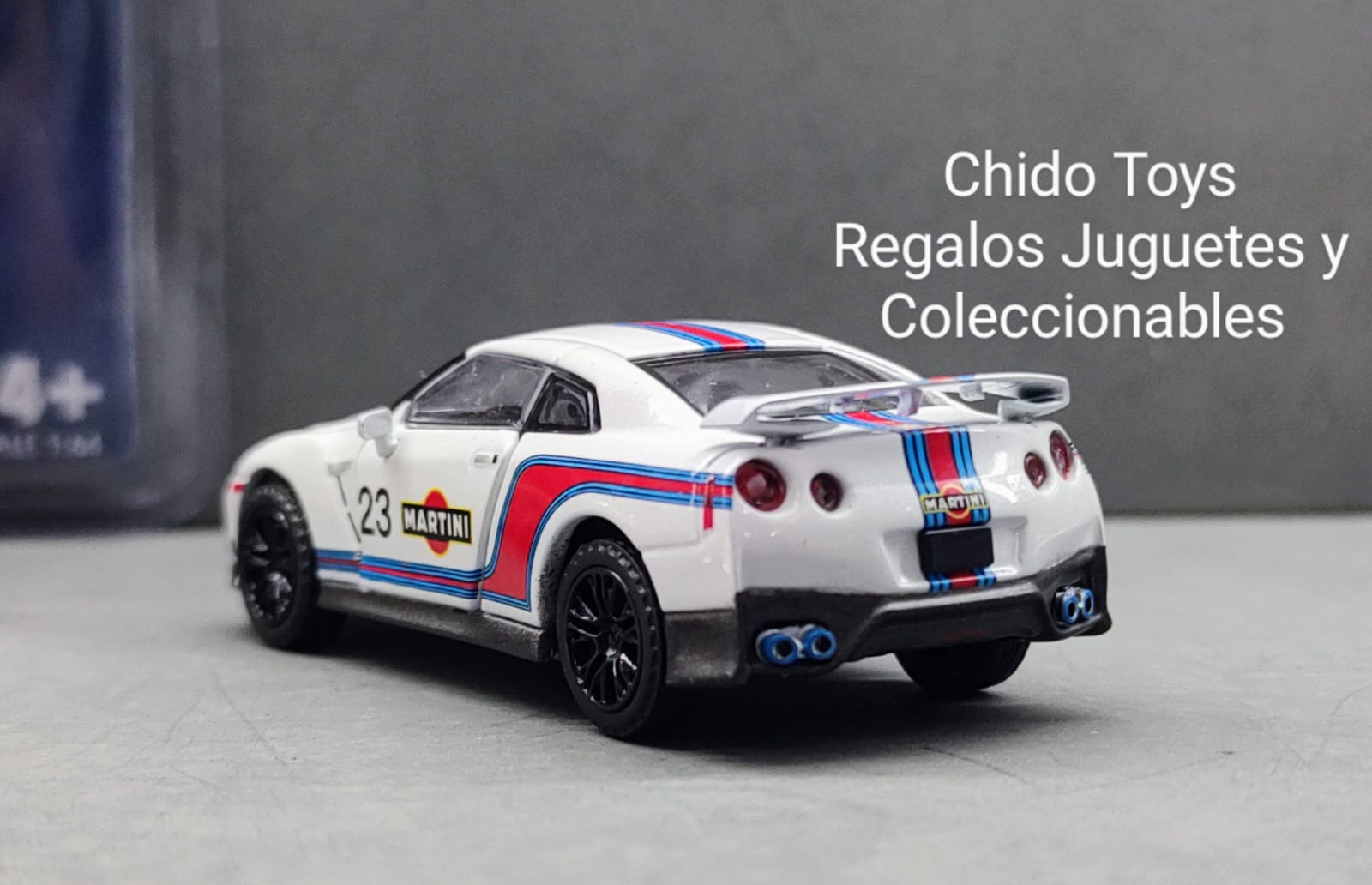 Auto a escala marca Era Car, Modelo Nissan GT - R R35 Martini 23 - Chido Toys