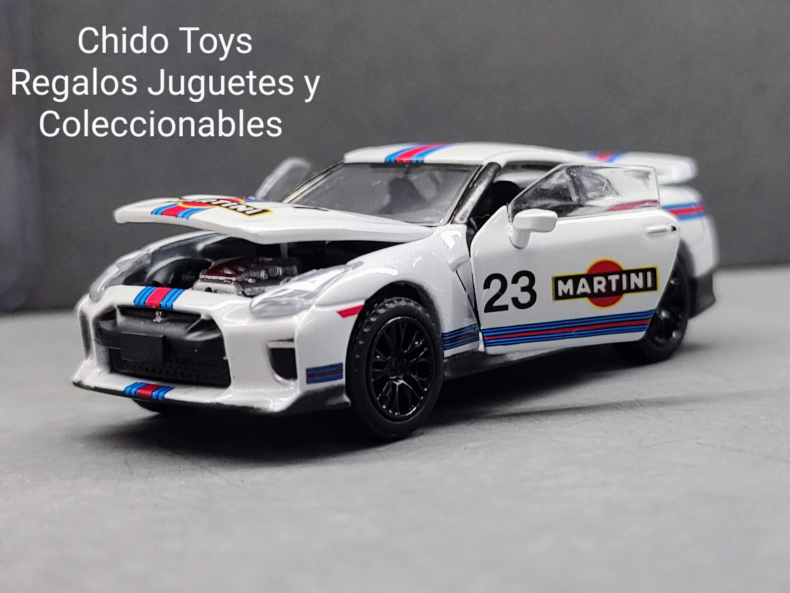 Auto a escala marca Era Car, Modelo Nissan GT - R R35 Martini 23 - Chido Toys
