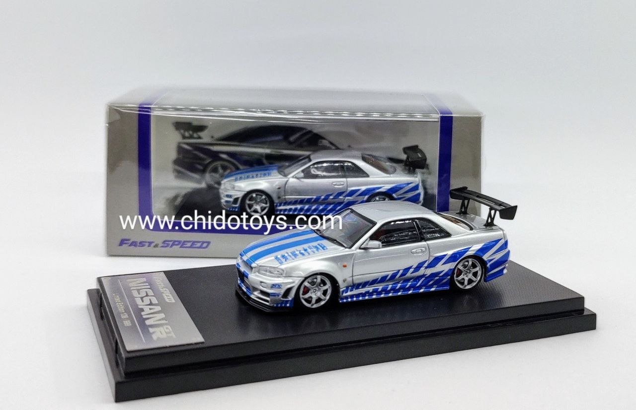 Auto a escala marca Fast Speed modelo Skyline GT - R R - 34 plata - azul - Chido Toys