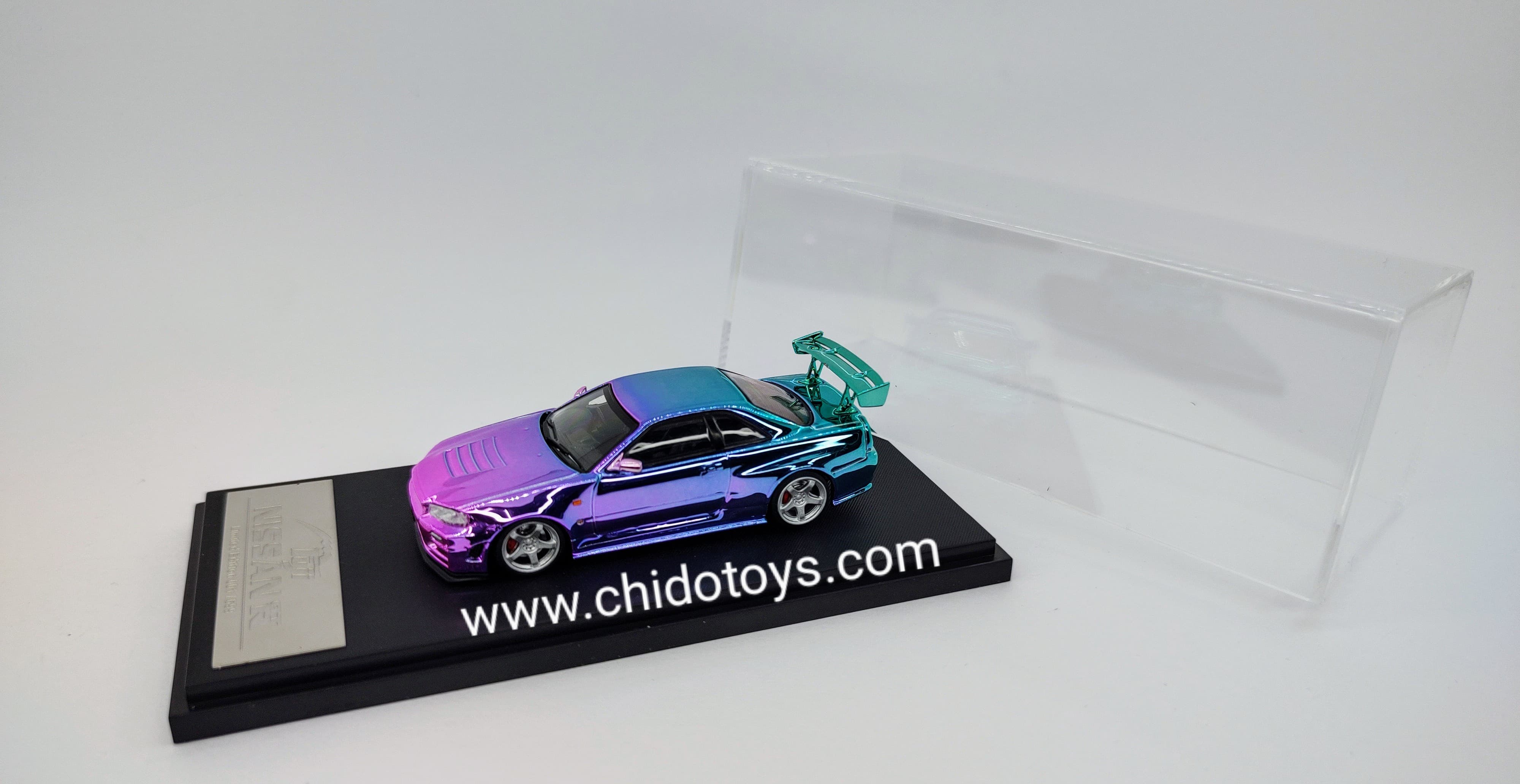 Auto a escala marca Fuji, Modelo Skyline GT - R R34 Nismo Z - Tune High Wing Purple - Blue Gradient - Chido Toys