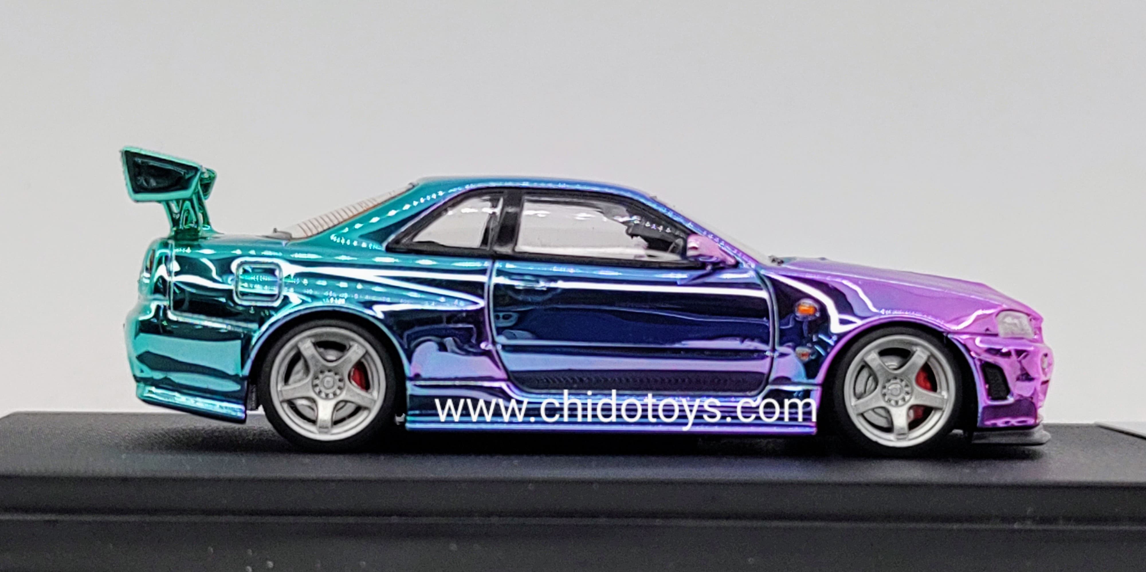 Auto a escala marca Fuji, Modelo Skyline GT - R R34 Nismo Z - Tune High Wing Purple - Blue Gradient - Chido Toys