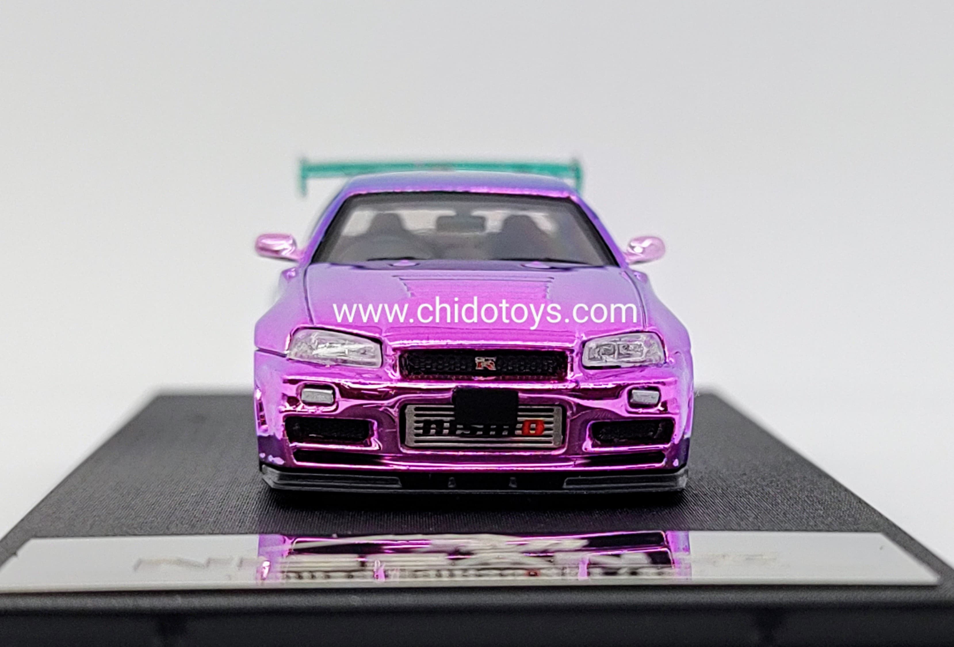 Auto a escala marca Fuji, Modelo Skyline GT - R R34 Nismo Z - Tune High Wing Purple - Blue Gradient - Chido Toys