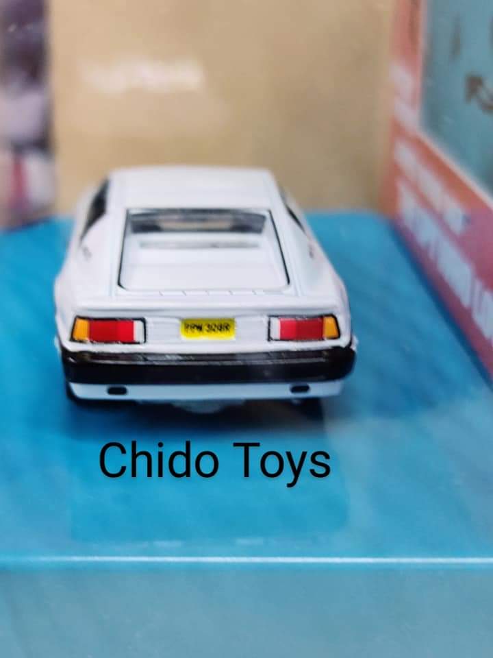 Auto a escala marca Johnny Ligftning, modelo Diorama 007 Lotus Espirit 1976, edad 6+, color blanco - Chido Toys