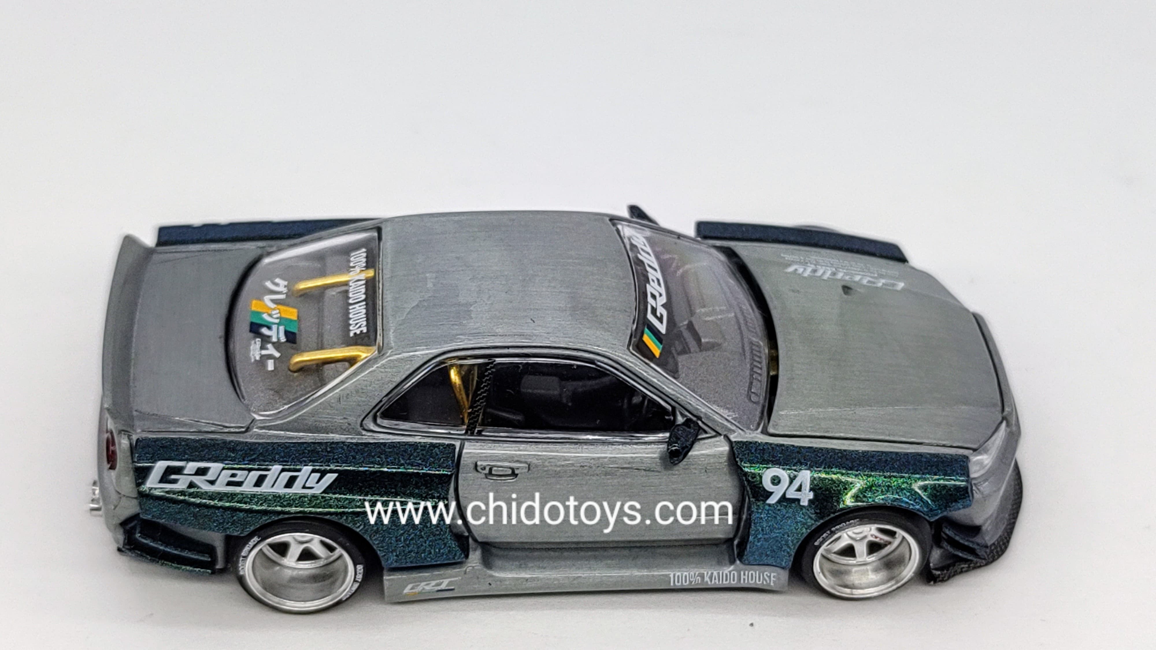 Auto a escala marca Kaido House, CHASE Skyline GT - R R34 - Chido Toys