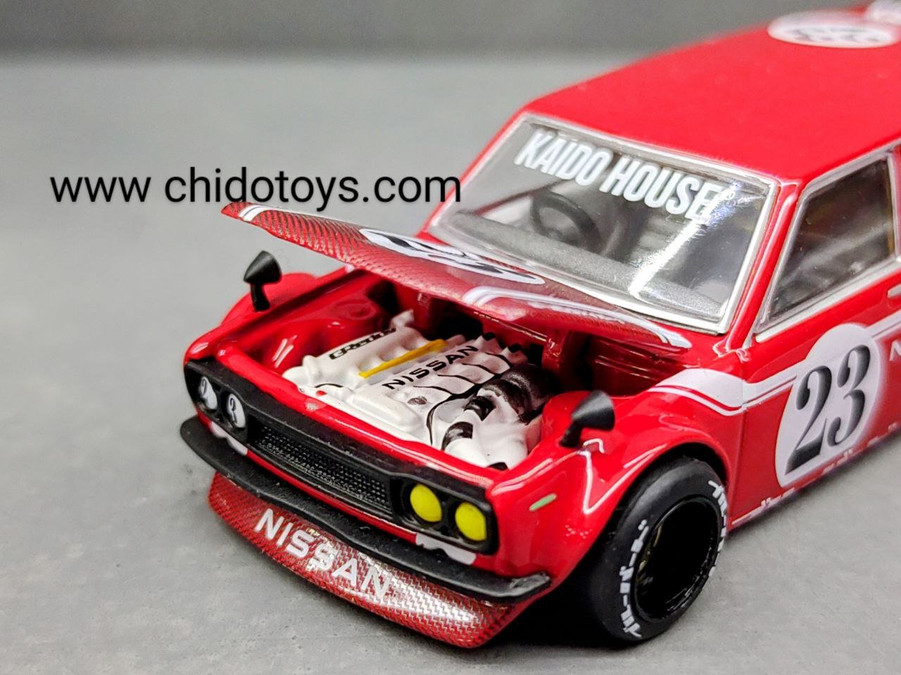 Auto a escala marca Kaido House & Mini GT, Modelo Wagon 510, Carbon Fiber V2 - Chido Toys