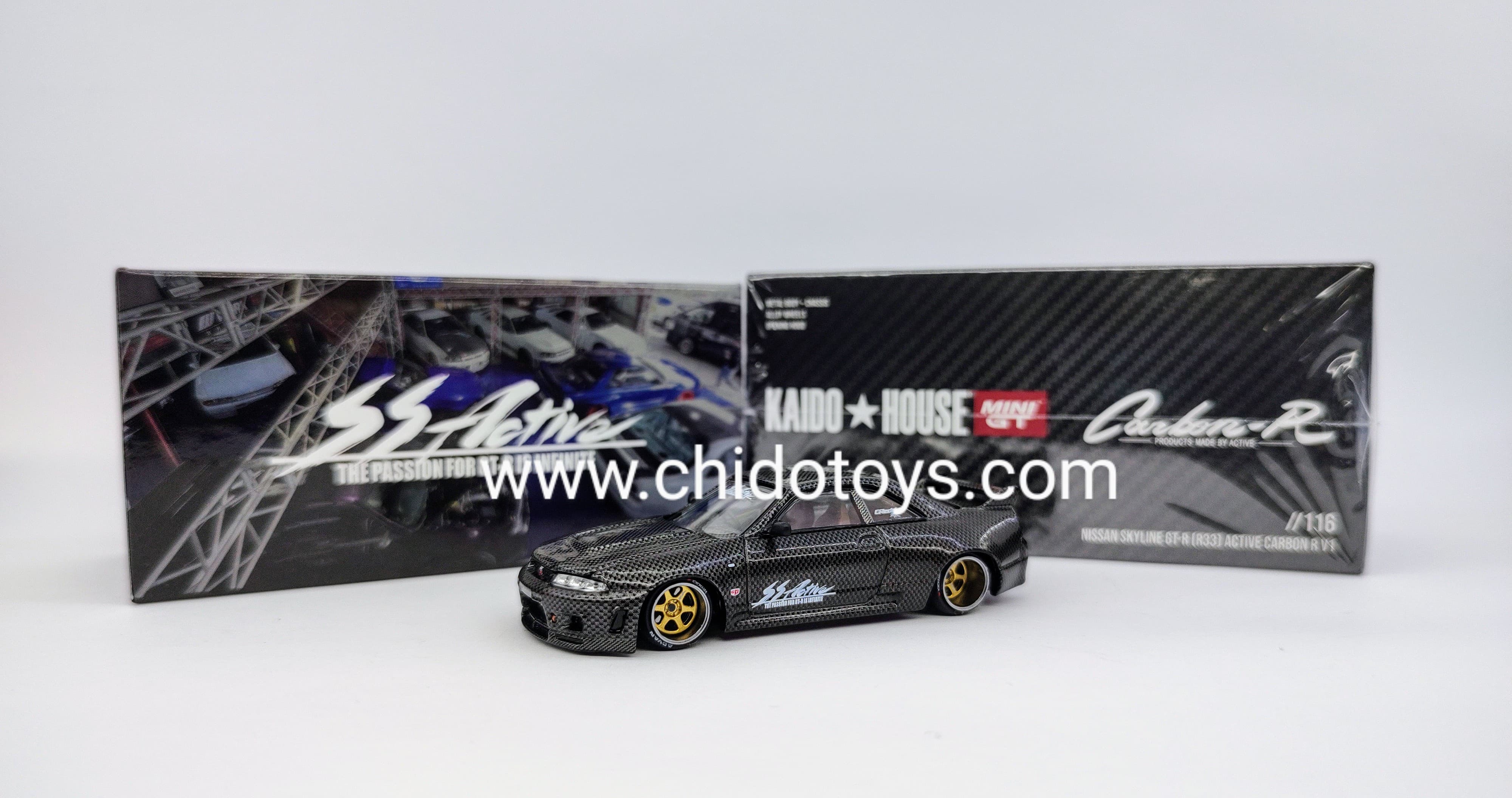 Auto a escala marca Kaido House, Modelo Nissan Skyline GT - R (R33) Active Carbon V1 - Chido Toys