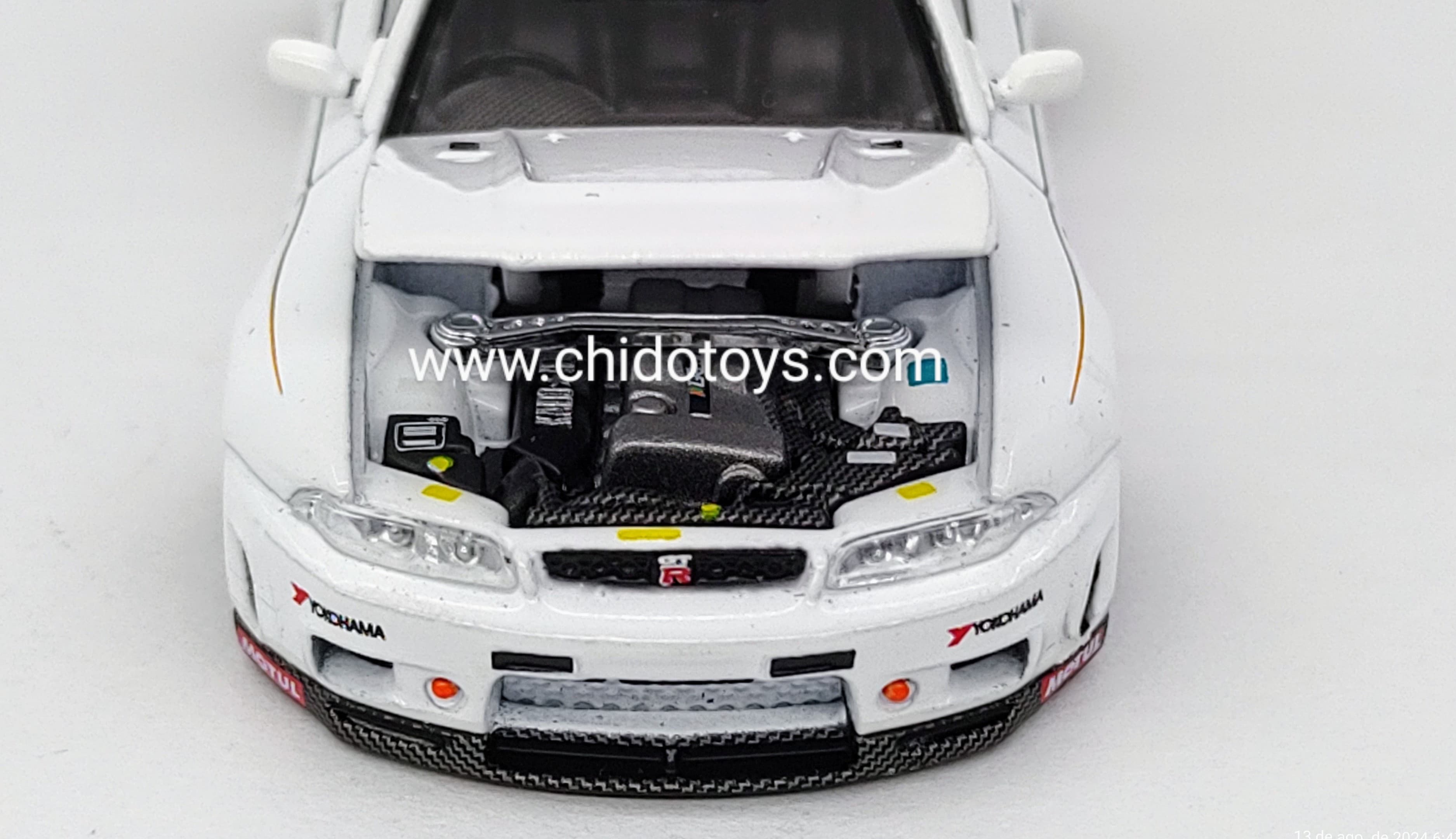 Auto a escala Marca Kaido House, Modelo Nissan Skyline GTR R33 - Chido Toys