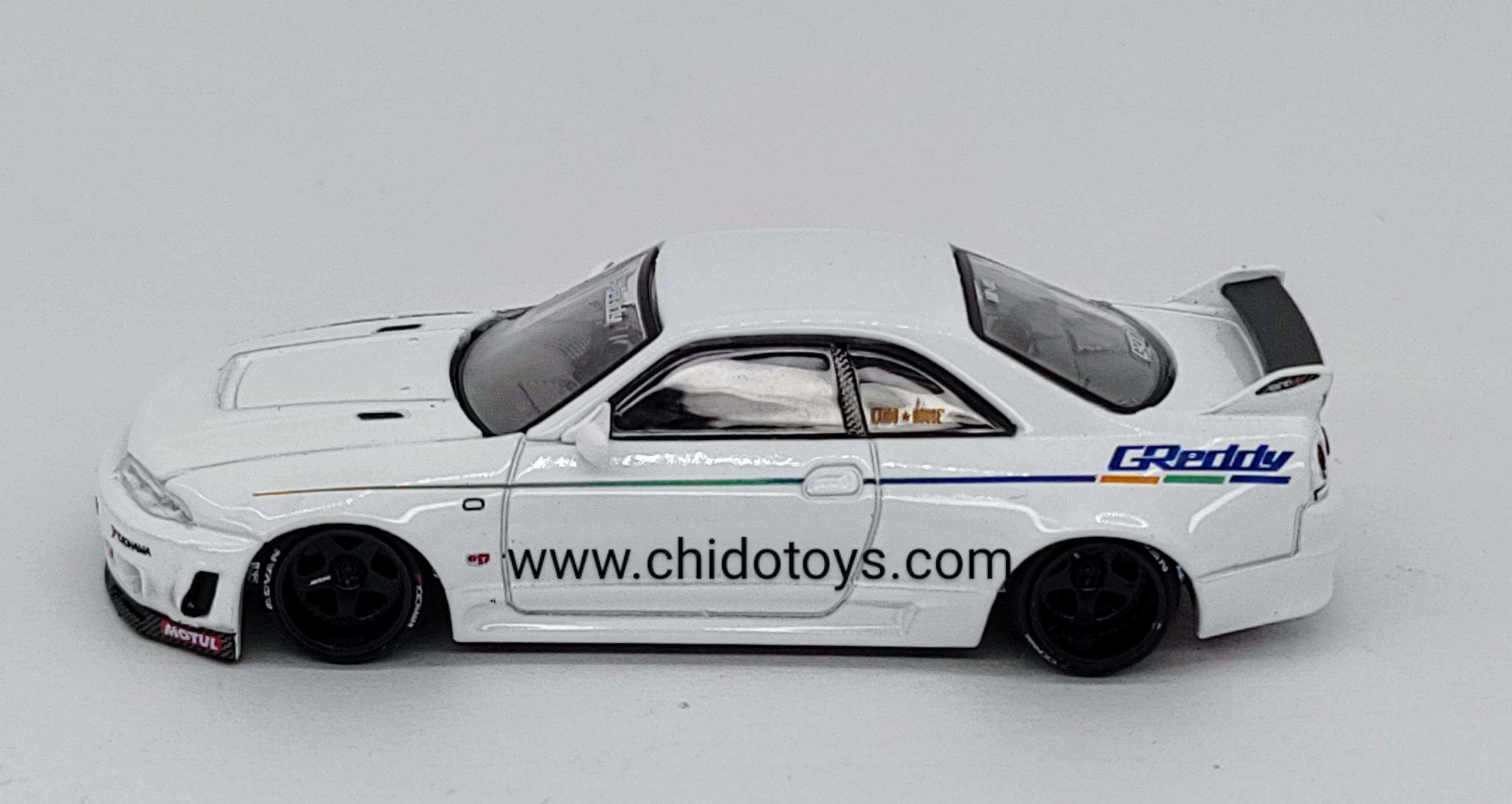 Auto a escala Marca Kaido House, Modelo Nissan Skyline GTR R33 - Chido Toys