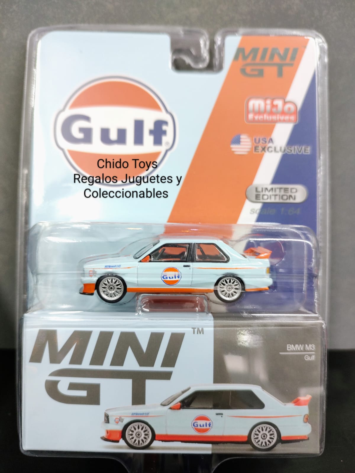 Auto a escala marca Mini GT, modelo BMW M3 E30 Gulf (LHD) - Chido Toys