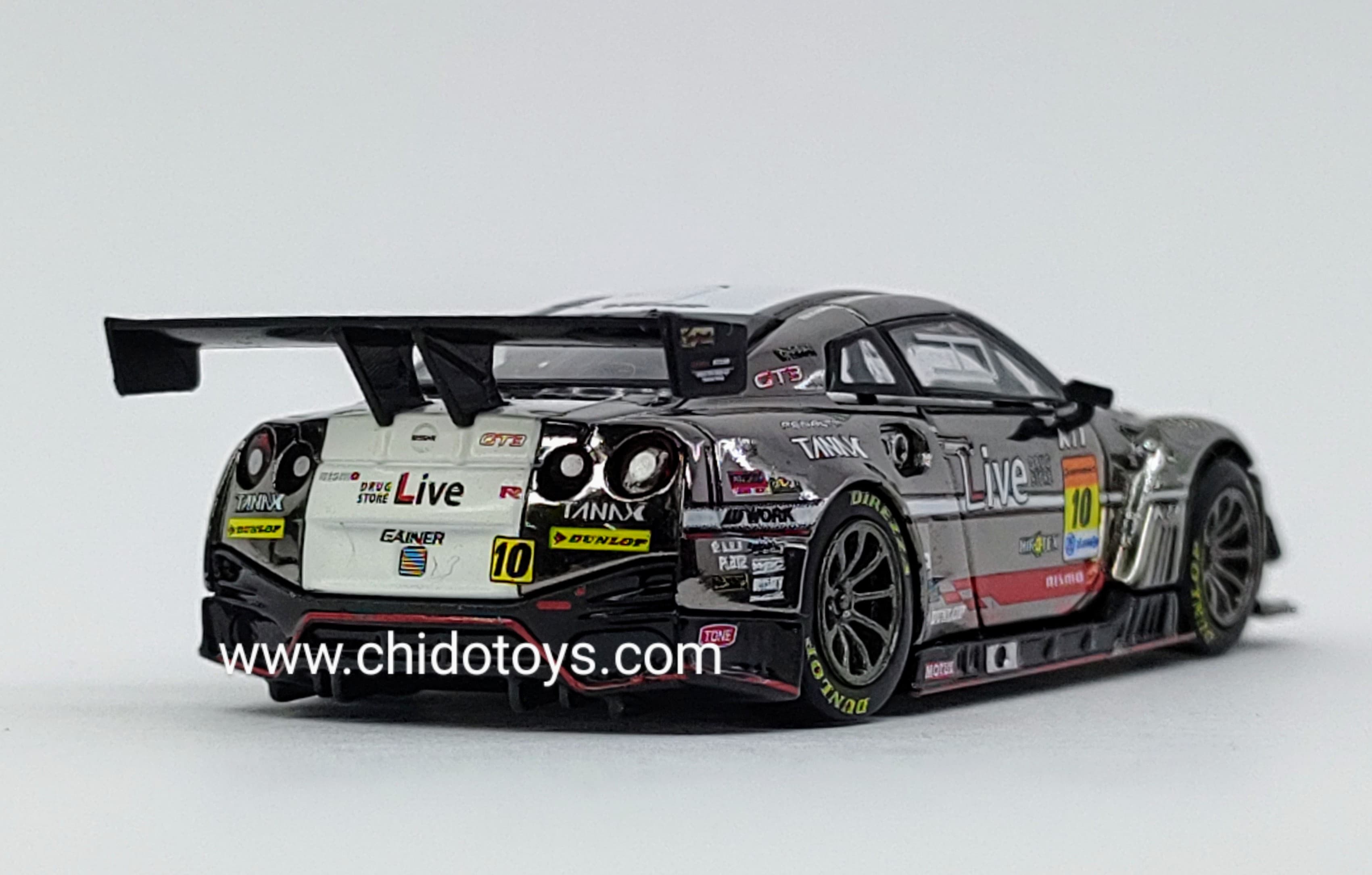 Auto a escala marca Mini Gt Modelo GT - R R35 Nismo GT3 TANAX - Chido Toys