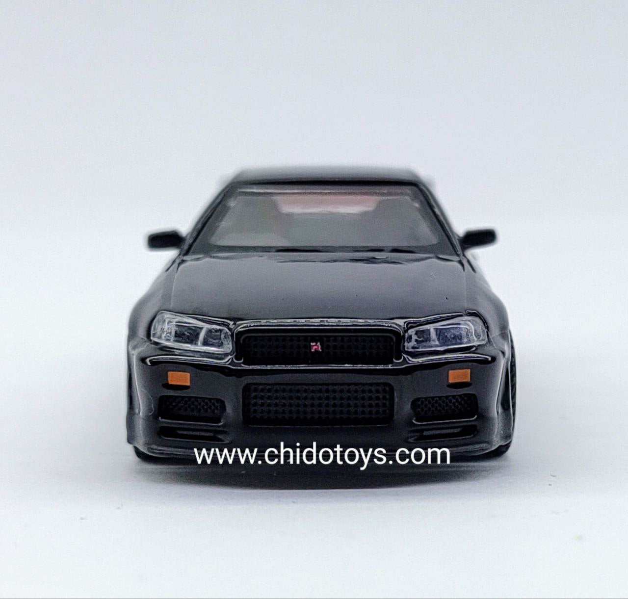 Auto a escala marca Mini GT, Modelo Nissan Skyline GT - R Black Pearl - Chido Toys