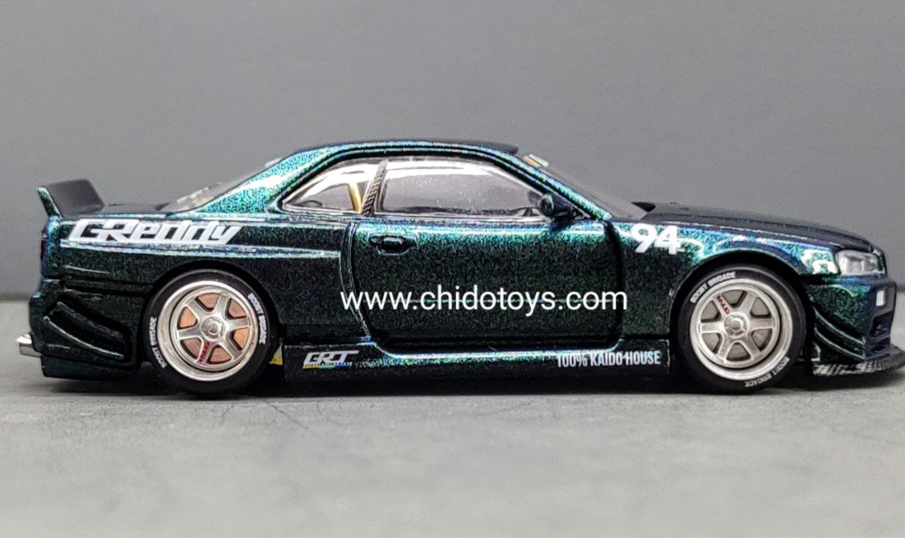 Auto a escala marca Mini GT, Modelo Nissan Skyline GT - R (R34) Kaido Works GReddy - Chido Toys