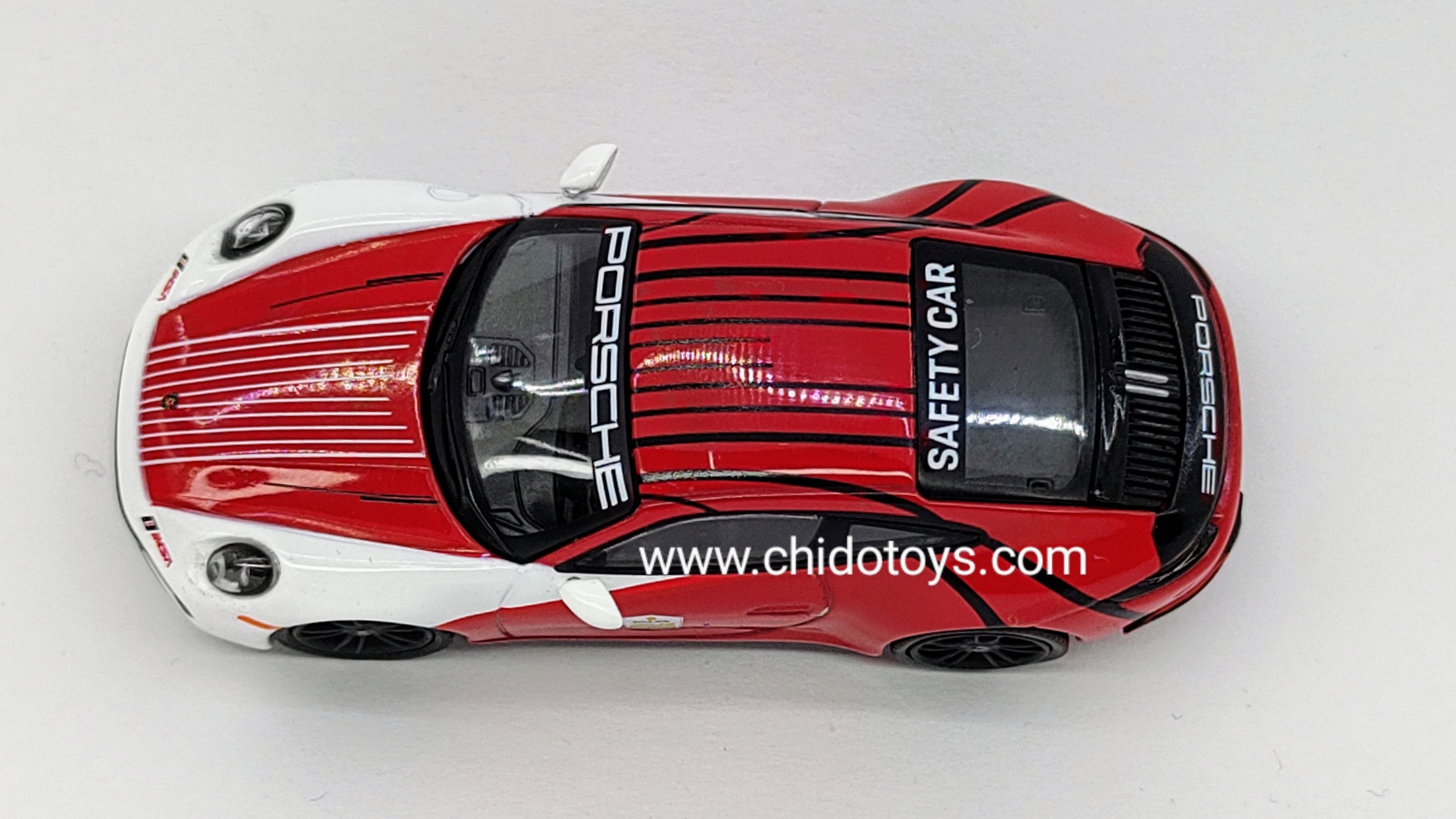 Auto a escala marca Mini GT Modelo Porsche 911 Carrera S, Safety Car IMSA 2023 - Chido Toys