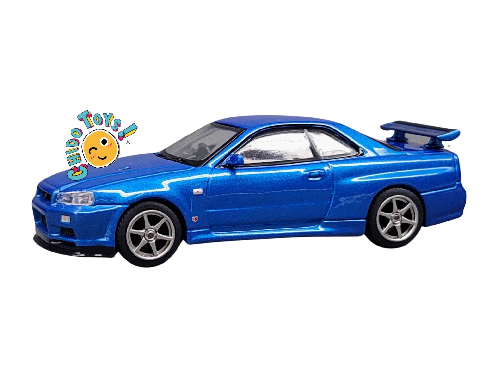 Auto a escala marca Mini GT Nissan Skyline GT - R (R34) V - Spec II Bayside - Chido Toys