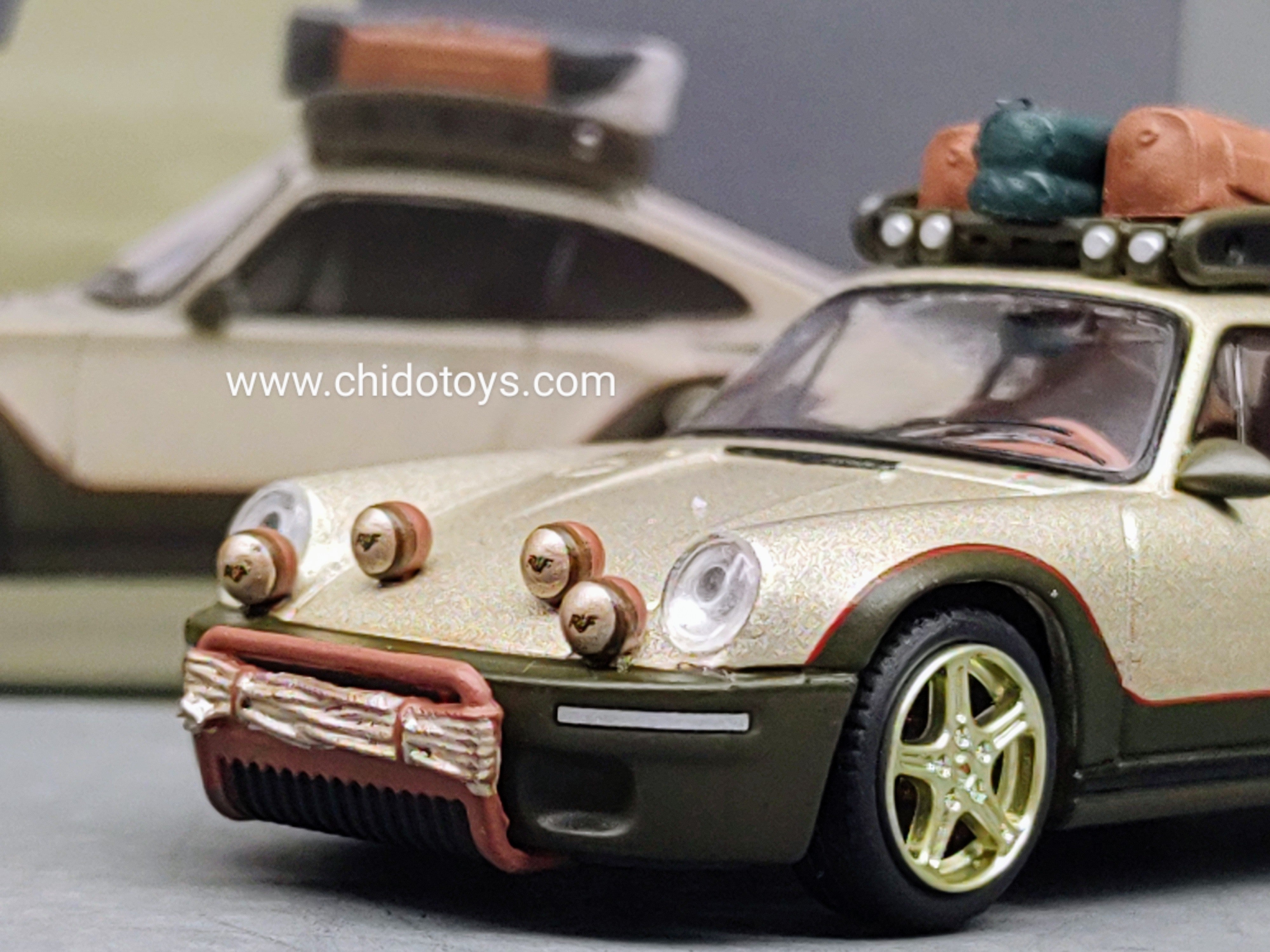 Mini GT × MiJo × RUF — RUF Rodeo “Presentation” 1:64 (Olive/Gold Mini GT × MiJo × RUF — RUF Rodeo “Presentation” 1:64 (Olive/Gold