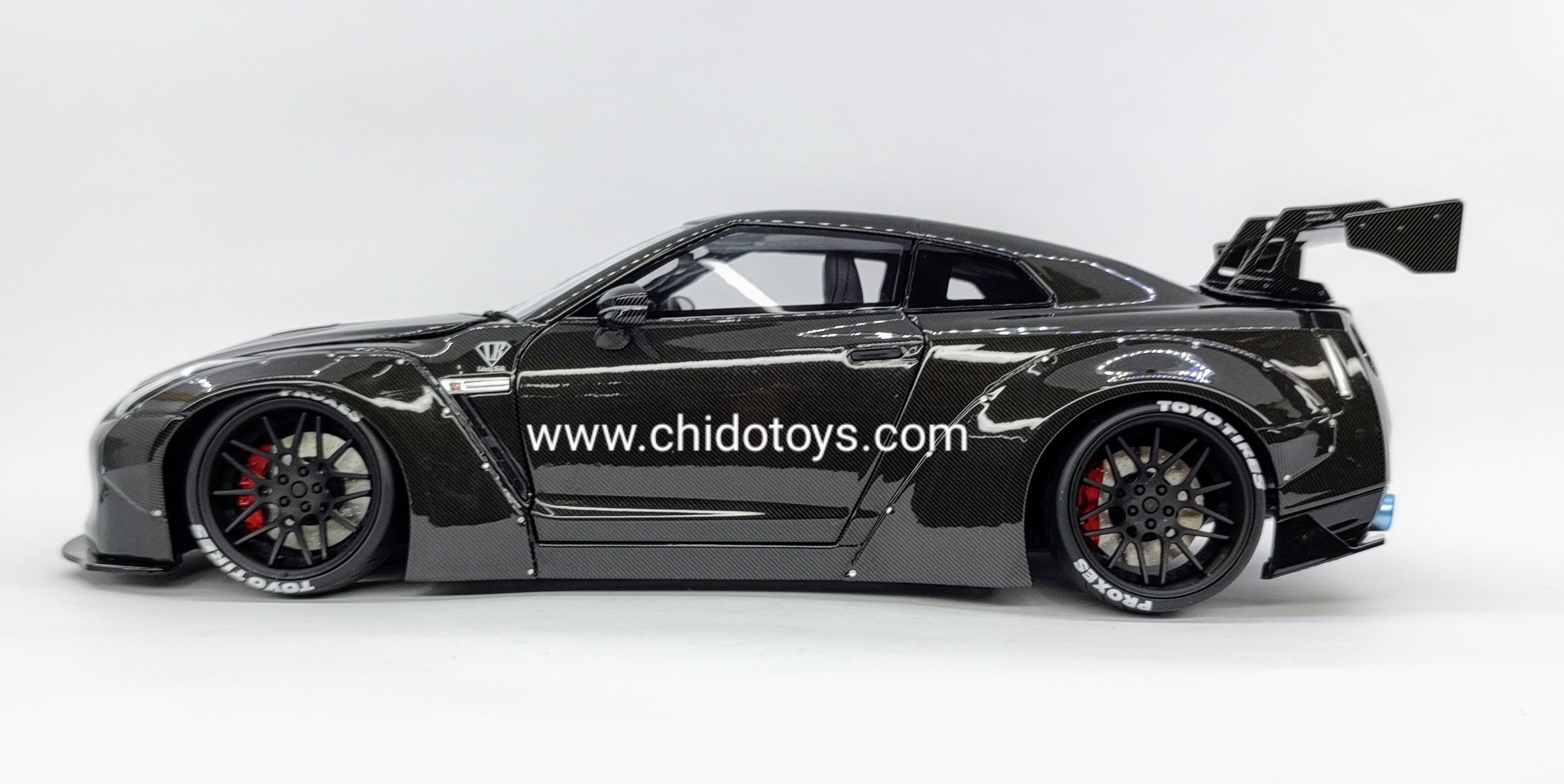 Auto a escala marca PGM, Modelo Nissan LBWK GT - R R35 excluisivo HEC 2024 - Chido Toys