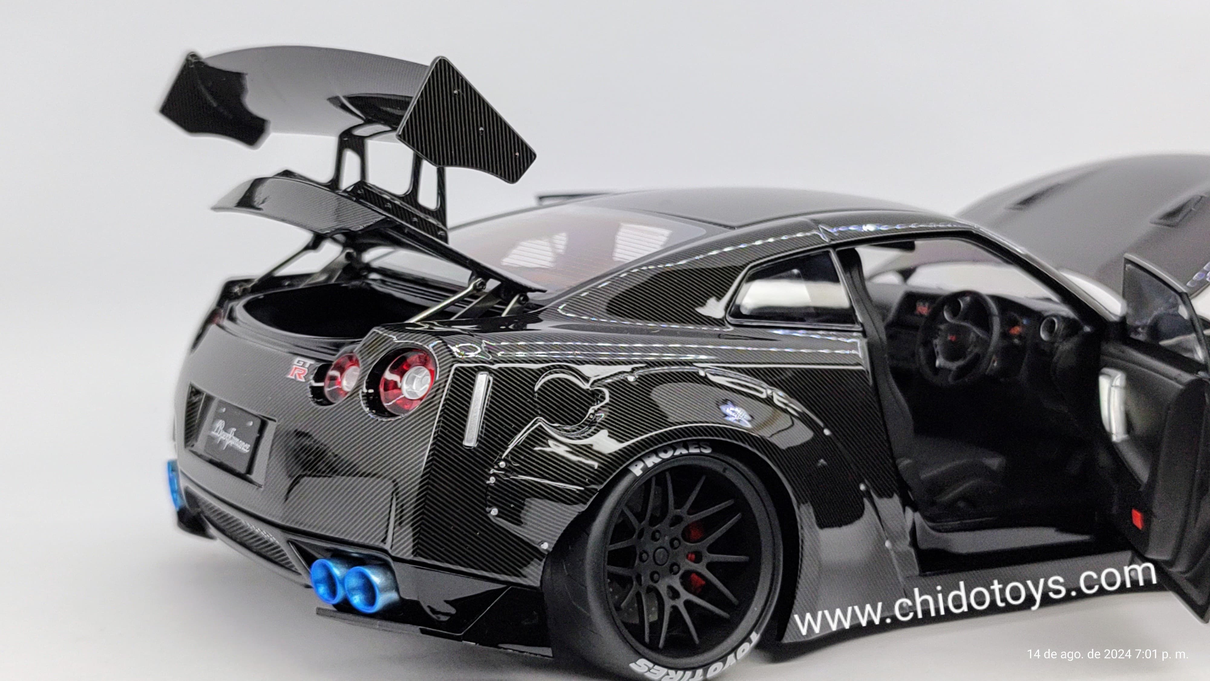 Auto a escala marca PGM, Modelo Nissan LBWK GT - R R35 exclusivo HEC 2024 - Chido Toys