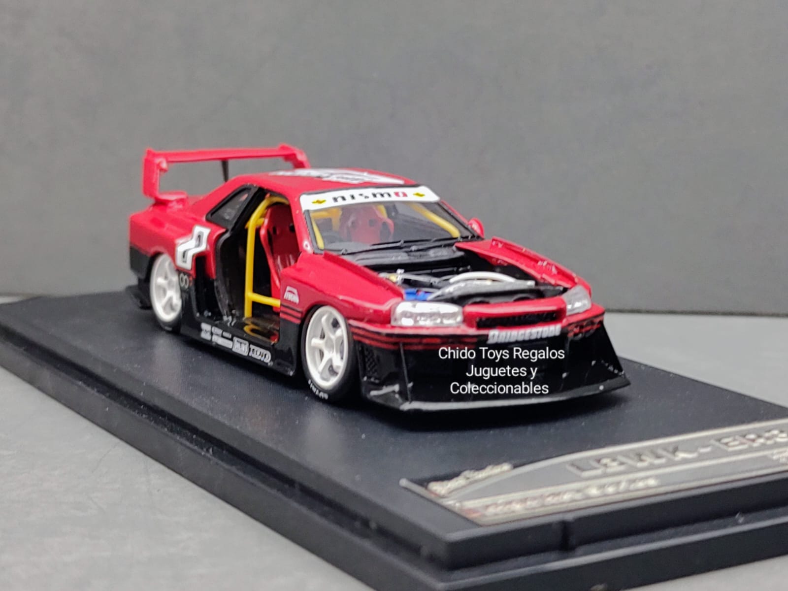 Auto a escala marca Stance Hunters High Rev Series, Modelo Nissan Skyline GTR34LBWK - ER34 Rojo - Chido Toys