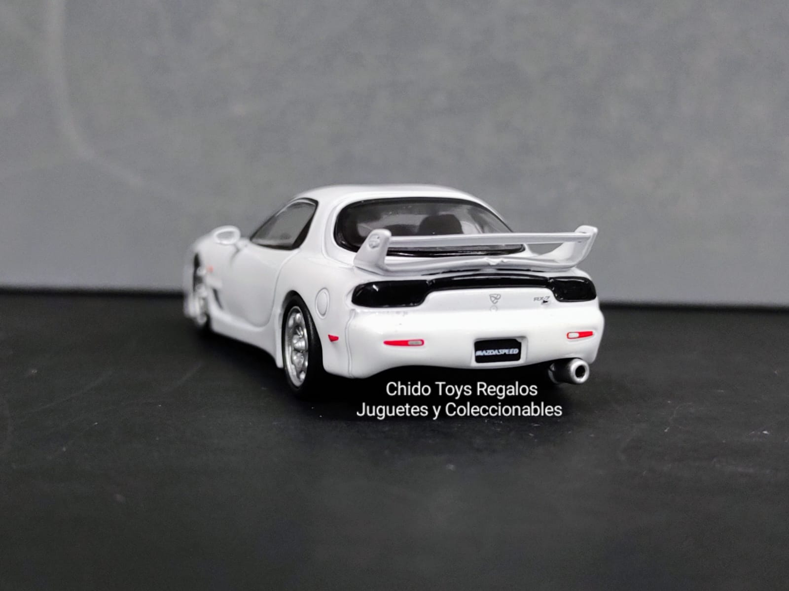 Auto a escala marca TARMAC, modelo Mazda RX - 3S - Chido Toys