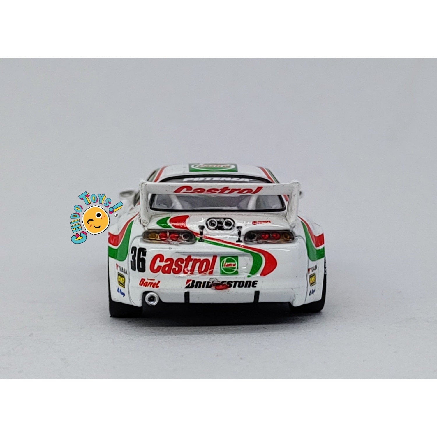 Auto a escala marca Tarmac Works, Modelo Toyota Supra GT JGTC 1995 M. Sekiya / M. Krumm con embalaje de camión - Chido Toys