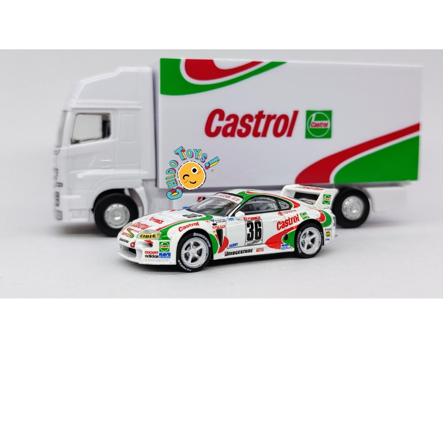 Auto a escala marca Tarmac Works, Modelo Toyota Supra GT JGTC 1995 M. Sekiya / M. Krumm con embalaje de camión - Chido Toys