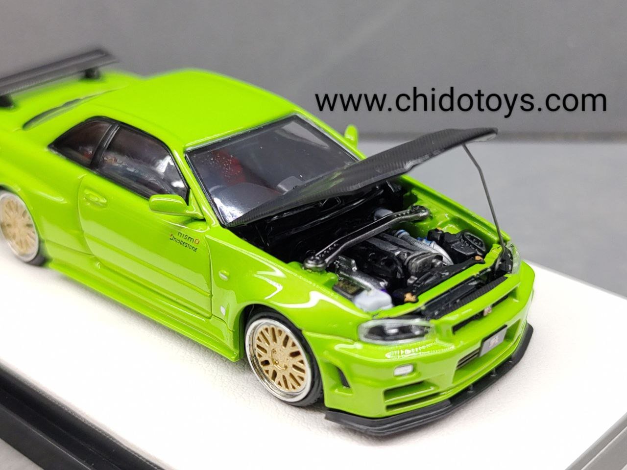 Auto a escala marca Time Micro, Modelo GT - R R34 - Chido Toys